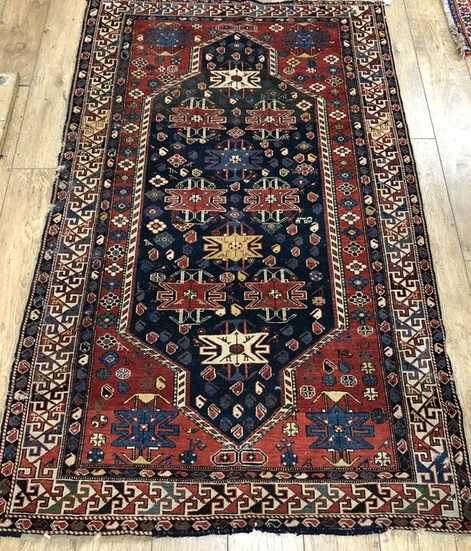 A Caucasian rug, 210 x 130cm